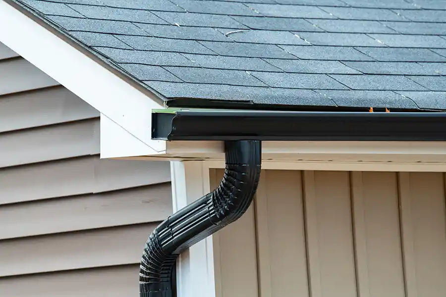 Black, k-style gutter system on a home